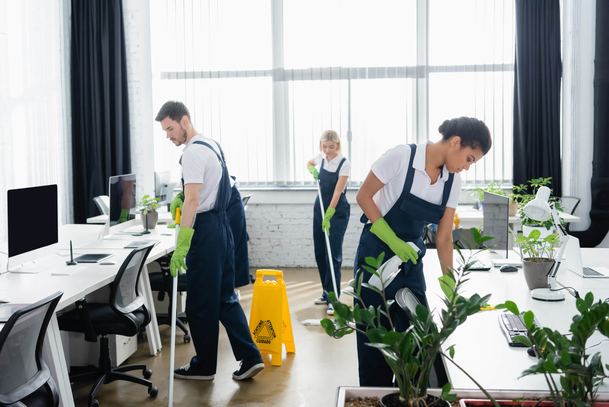 three people cleaning