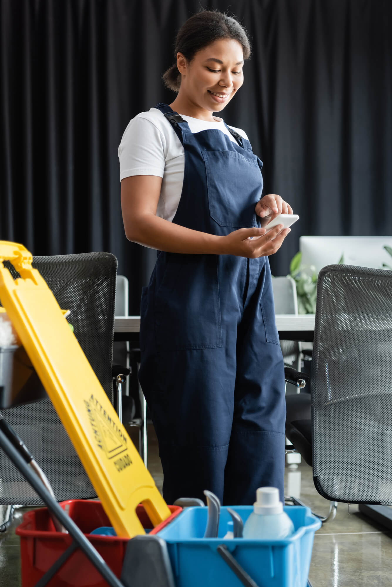 woman smiling at phone