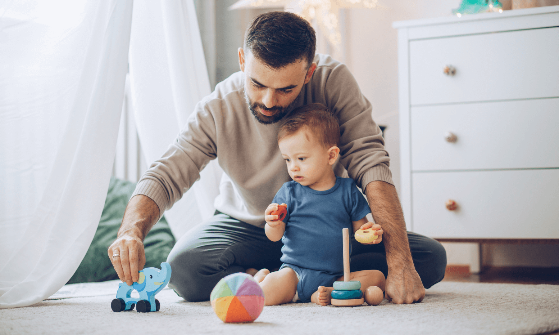 father playing with his child